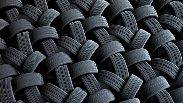 Endless chaotic stack of new tires.Automotive modern manufacturing rubber.