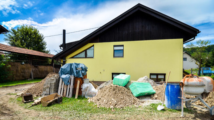 Rebuilding a family house and adding an .extension.