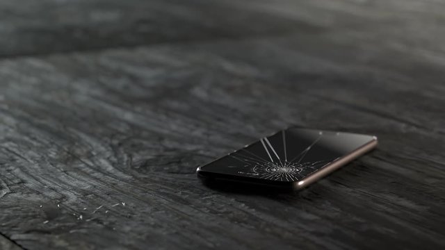 Smartphone crashes onto the wooden floor. Accident insurance coverage.