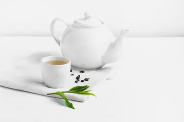Papier Peint photo Theé Green tea In white cup White background aroma  
