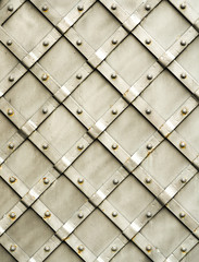 Metal expanded lath on  yellow background