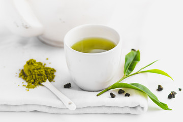 Green tea In white cup White background aroma  