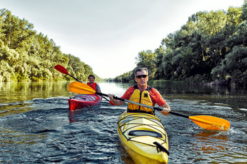 A canoe trip on the river in the summer.