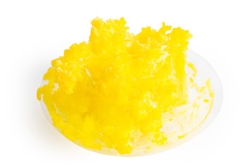 Growing yellow crystal on plastic substrate, children chemical experience game isolated on white