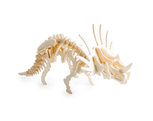 Wooden beautiful model of dinosaur triceratops isolated on white