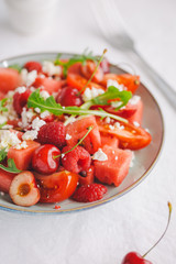 Summer salad with fruits and vegetables