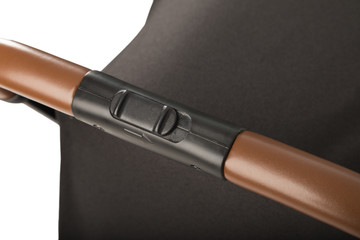 A stroller on a white background, details of a stroller close-up.