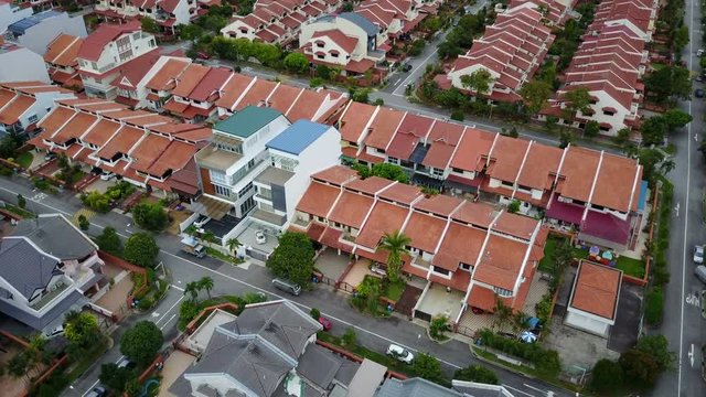 Aerial view of low-rise private villas and public high-rise apartment blocks in Singapore