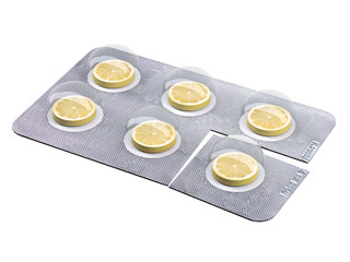 lemon slice pills in blister isolated on white background