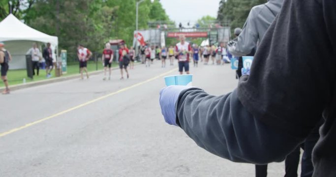 Offering water at Ottawa Marathon - Ottawa Ontario Canada May 27 2018
