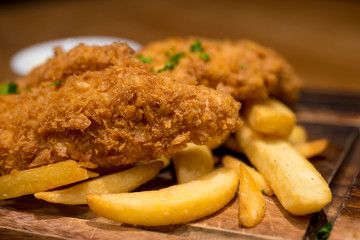 Fish and chips is a hot dish of English origin consisting of fried battered fish and hot potato chips