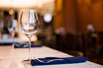 Empty Wine Glasses on table in restaurant