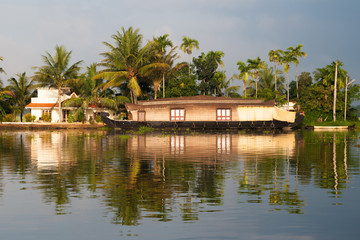 Fototapeta na wymiar Tourist houseboat on backwaters, Kerala, India