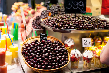 Heap of cherries on La Boqueria Market in Barcelona, Spain