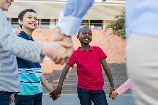 Group of children holding hands