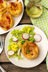 Flaky pastry bun filled with mozzarella cheese and tomato