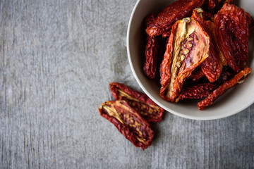 Dried tomatoes in ceramic bowl
