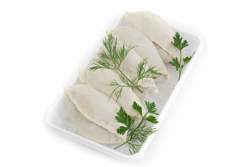 Freshly frozen semi-finished products. Patties with stuffing. The product is packed on plastic potdtons. Isolate on white background.