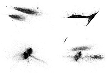 Scattered powder falls, stains, splashes, powder explosion. On an isolated background. Grunge blots trail and spray.