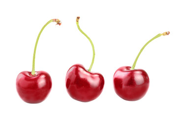 Sweet red cherries isolated on white background macro.