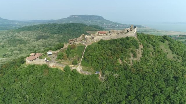 Aerial shot of European castle, fortress. Szigliget castle - Hungary, lake Balaton