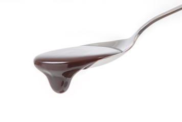 chocolate syrup pouring on spoon, cooking, baking