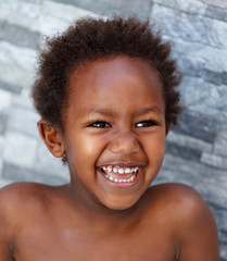 African little kid four years in a happy summer day