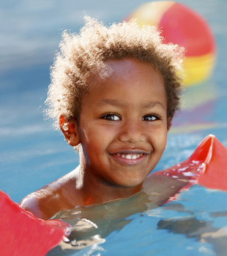 Little african child in the pool