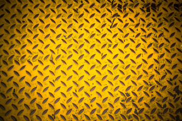 yellow metal sheet with dark vignette, grunge steel  plate background