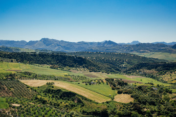 Fototapeta na wymiar View of the countryside and the surrounding mountains from Ronad, Andalusia, Spain.