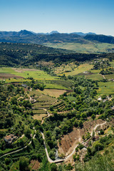 Fototapeta na wymiar The view of the mountains and countryside seen from Ronda in Andalusia, Spain.