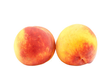 Fresh peach fruits isolated on white background