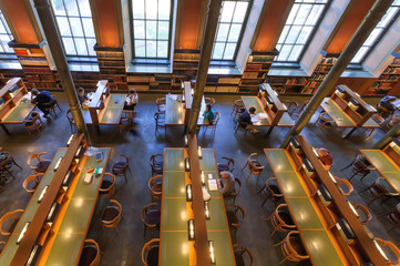 People reading books in silence of the National Library of Sweden