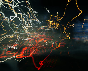 abstract night scenes highway with traffic light background movement of machines blur night