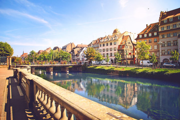 beautiful canal in Strasbourg, France, view of the river, park and architecture - obrazy, fototapety, plakaty