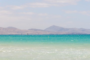 windsurfers in the ocean