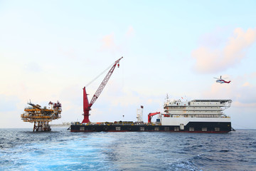 Offshore construction platform for production oil and gas. Oil and gas industry and hard work....