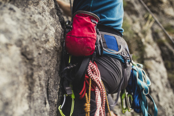 Naklejka premium Mountaineer Climbing a Rock