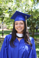 Graduate women in cap and gown