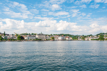 Naklejka premium city of gmundenskyline seen from the water traunsee