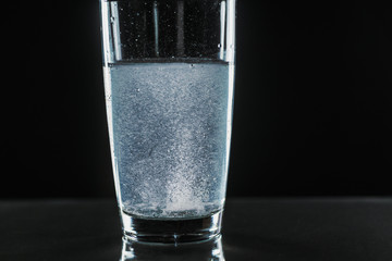 Tablet dissolving in water