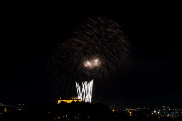 Beautiful colorful firework in city Brno on Spilberk