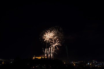 Beautiful colorful firework in city Brno on Spilberk