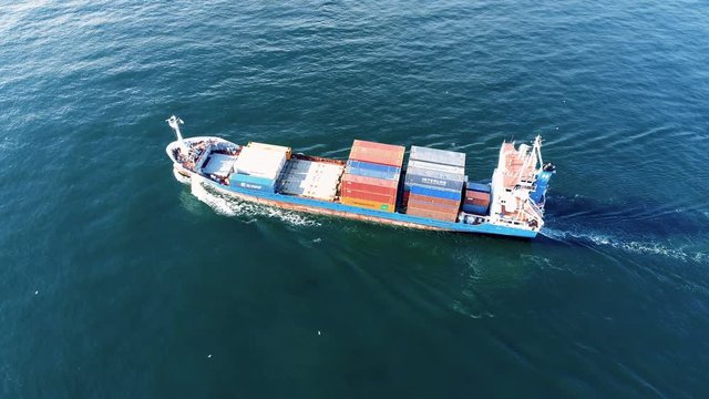 Small Cargo Container Ship, Aerial Pan Around Shot
