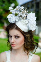 Obraz premium portrait of young sensual woman posing in elegant headwear