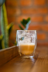  Half-empty or half-full glass with latte