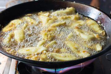 Fried bananas close-up in national dishes
