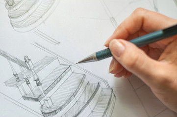 Girl hand with pencil draws sketch of stairs. Closeup