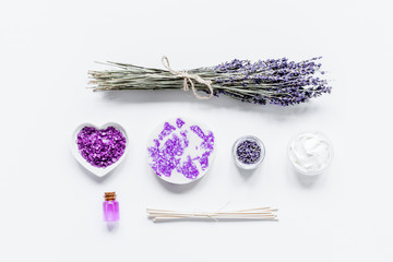 lavender flowers in organic cosmetic set on white background top