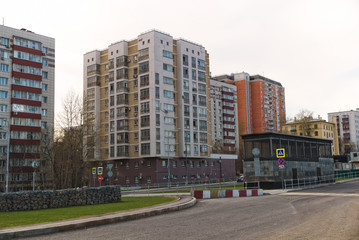 View of residential buildings in a modern city. Near the entrance to the subway.